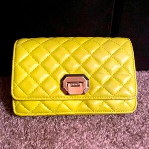Neon green Aldo crossbody bag.